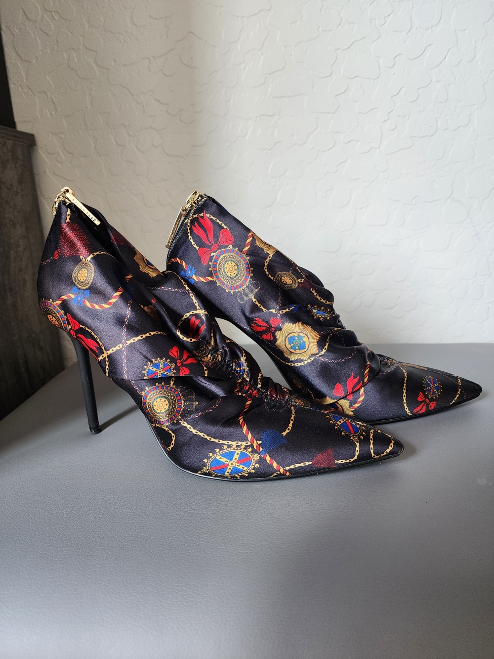 Zara Black Satin Pointed-Toe Stiletto Ankle Boots with Gold Chain & Red Accents